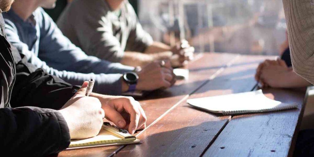 software development team using GitLab VSM in modern office