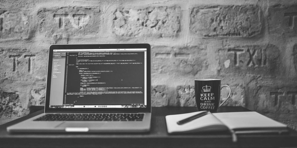 software development team working on CI/CD pipeline tools in modern office