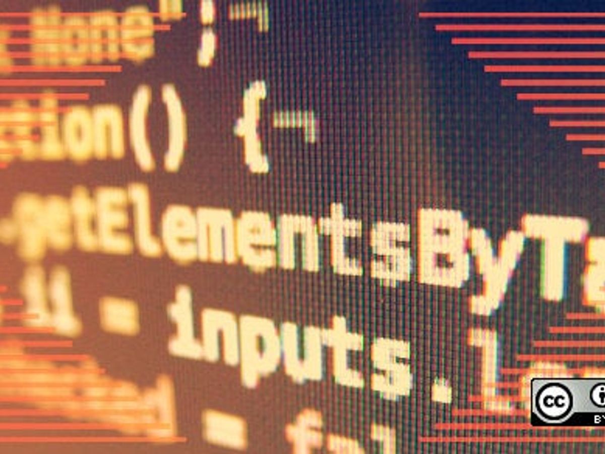 DevOps engineer working on a computer