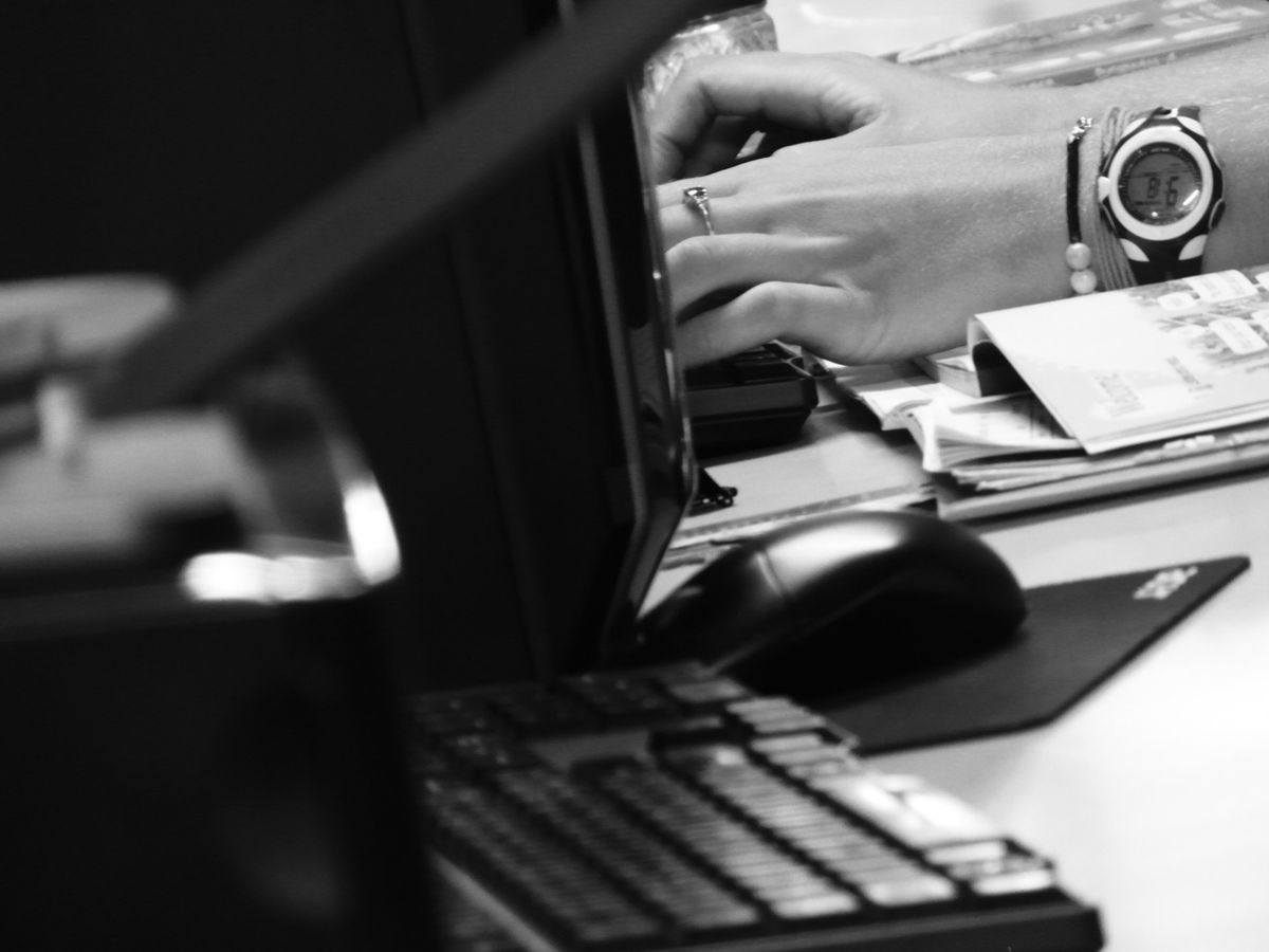 DevOps engineer working on computer